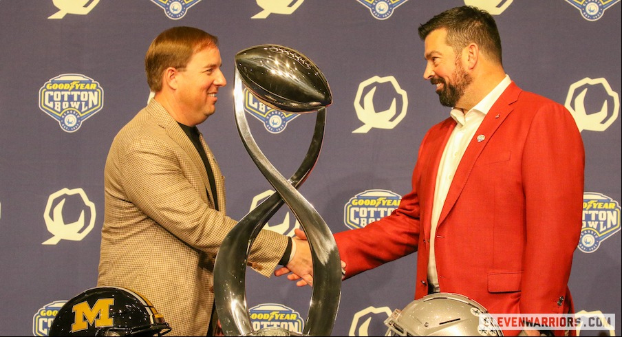 Eliah Drinkwitz and Ryan Day with the Cotton Bowl trophy