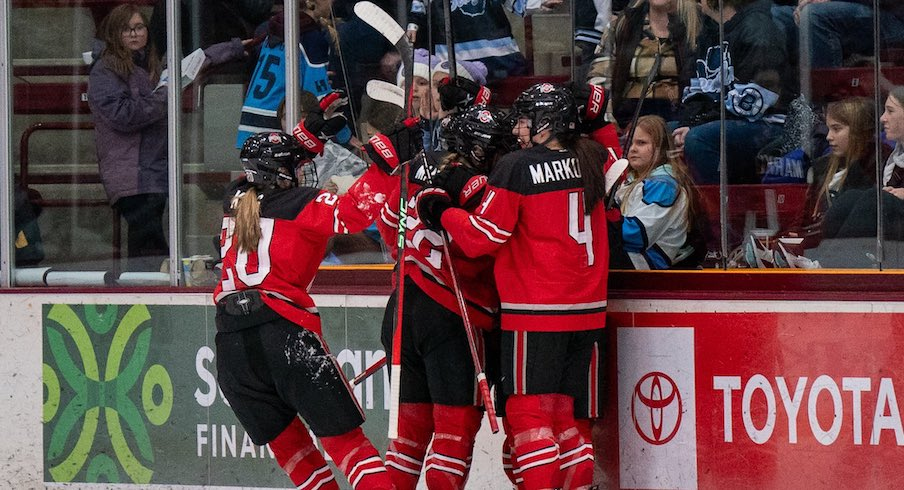 Ohio State women’s hockey celebrating its 7-0 win at Minnesota