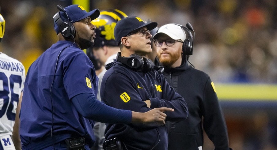 Jim Harbaugh and Sherrone Moore