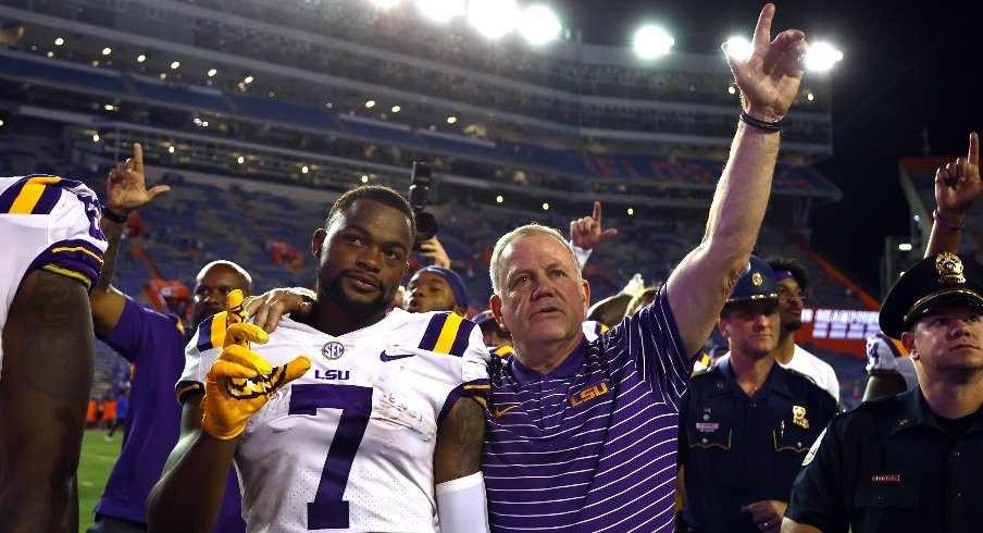 Former LSU wide receiver Kayshon Boutte (left) and current head coach Brian Kelly (right)