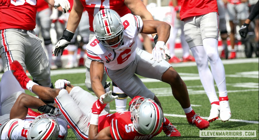 Sonny Styles tackling Dallan Hayden in the 2023 spring game