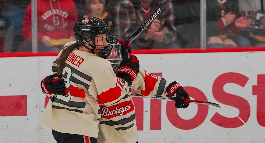 Ohio State women’s hockey celebrates a goal in Saturday’s win over St. Thomas
