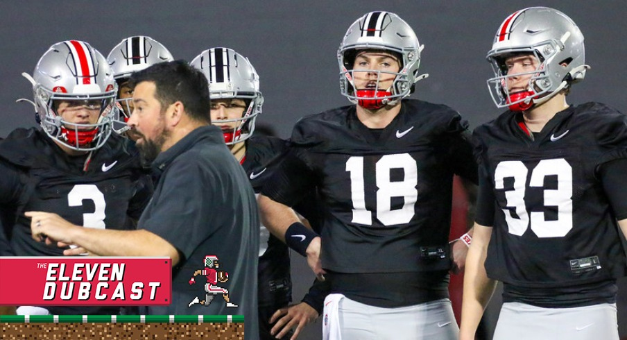 Ohio State quarterback room takes direction from head coach Ryan Day at spring practice.