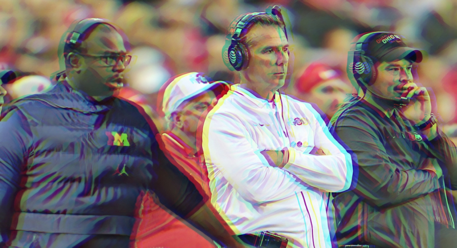Sep 22, 2018; Columbus, OH, USA; Ohio State Buckeyes head coach Urban Meyer (center) watches the game from the sidelines with assistant coach Ryan Day (right) and assistant coach Tony Alford (left) during the third quarter against the Ohio State Buckeyes at Ohio Stadium. Mandatory Credit: Joe Maiorana-USA TODAY Sports