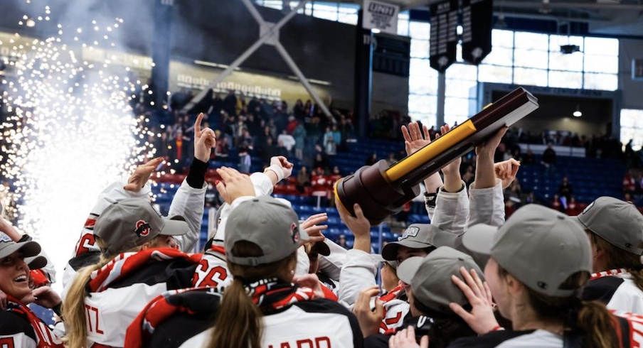 Ohio State celebrates with the national championship trophy