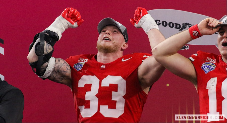 Jack Sawyer celebrating the Cotton Bowl win