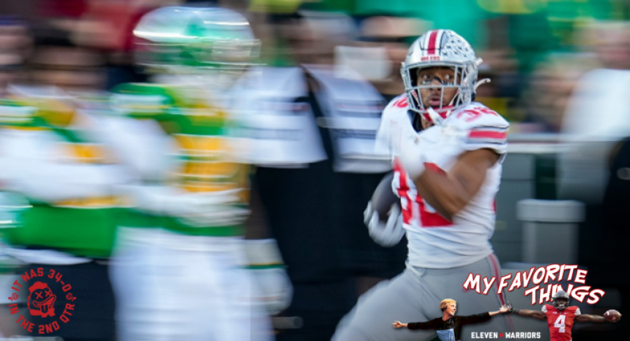 Ohio State Buckeyes running back TreVeyon Henderson (32) runs for a touchdown during the College Football Playoff quarterfinal against the Oregon Ducks at the Rose Bowl in Pasadena, Calif. on Jan. 1, 2025. Ohio State won 41-21.