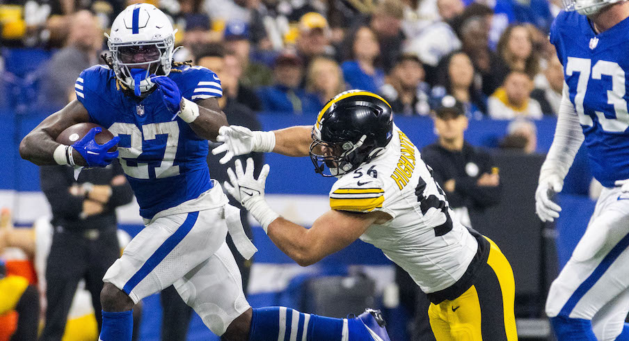 Trey Sermon running past Pittsburgh Steelers linebacker in 2023