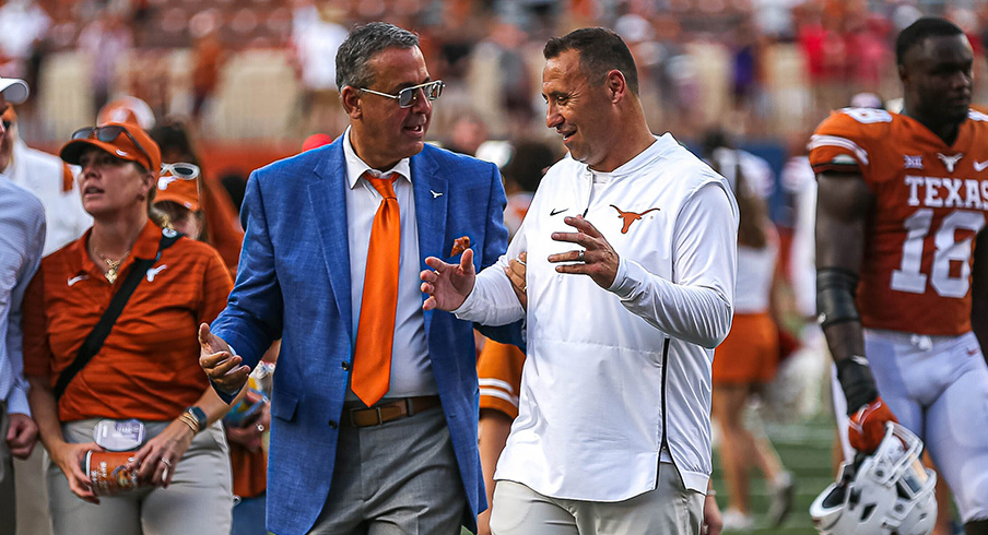 Chris Del Conte and Steve Sarkisian