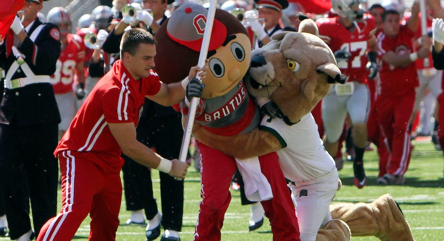 Rufus tackling Brutus before Ohio State’s 2010 game vs. Ohio