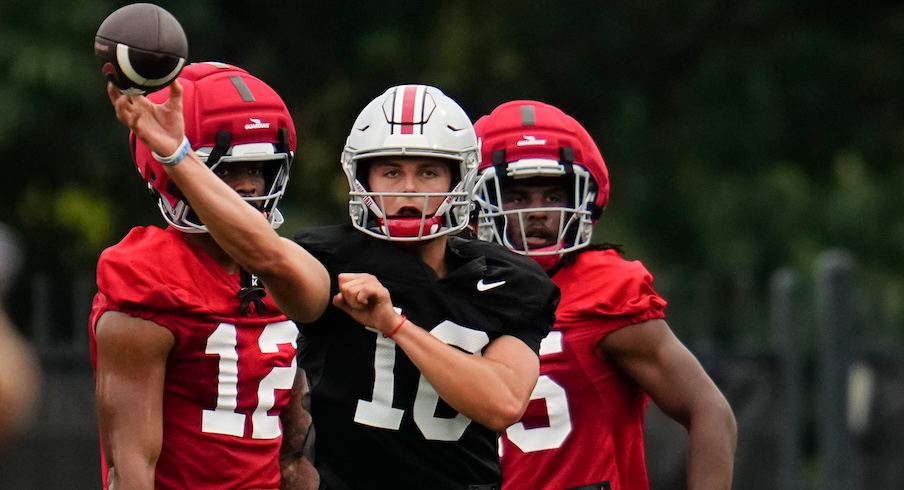 Julian Sayin throwing at preseason camp