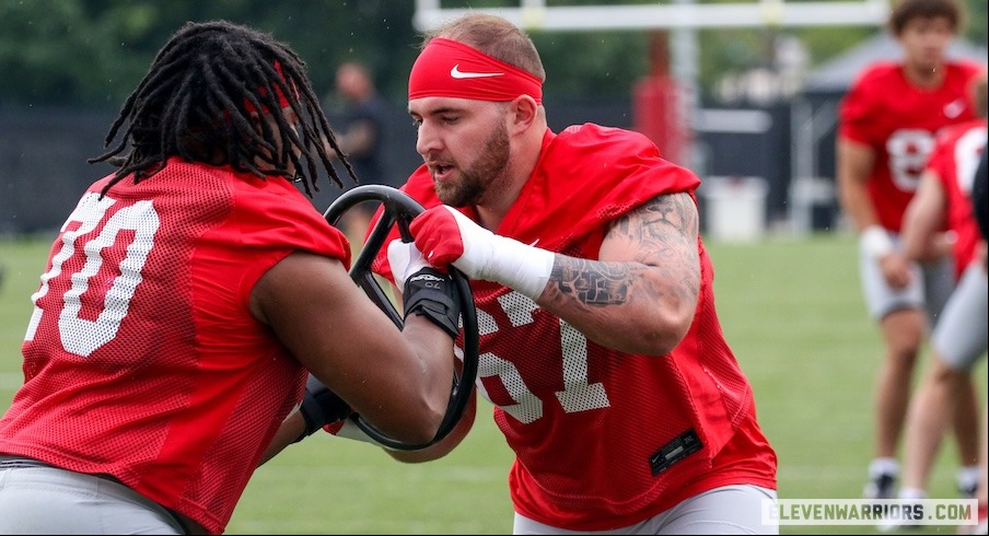 Austin Siereveld in a practice drill vs. Phillip Daniels