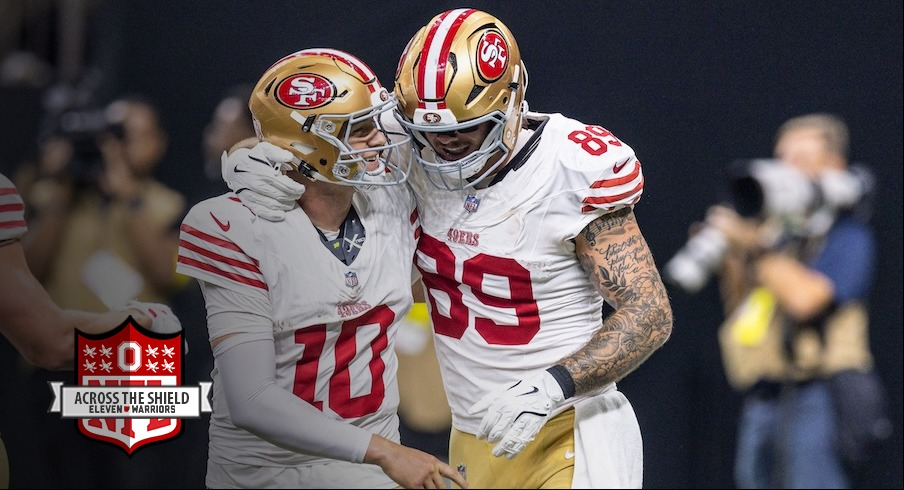 Luke Farrell celebrating his touchdown with Mac Jones