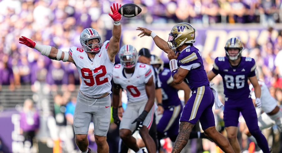 Caden Curry rushing the passer vs. Washington QB Demond Williams Jr.