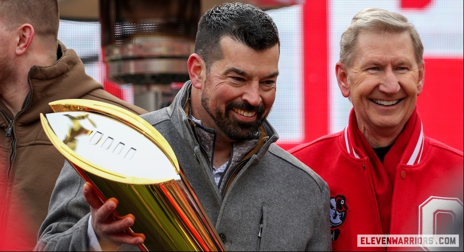 Ryan Day and Ted Carter with the College Football Playoff trophy