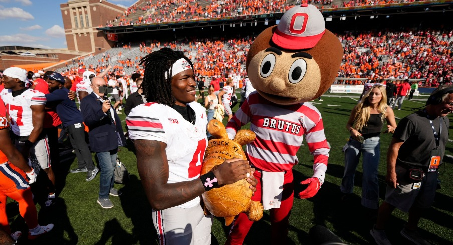 Ohio State wide receiver Jeremiah Smith with Illibuck and Brutus Buckeye