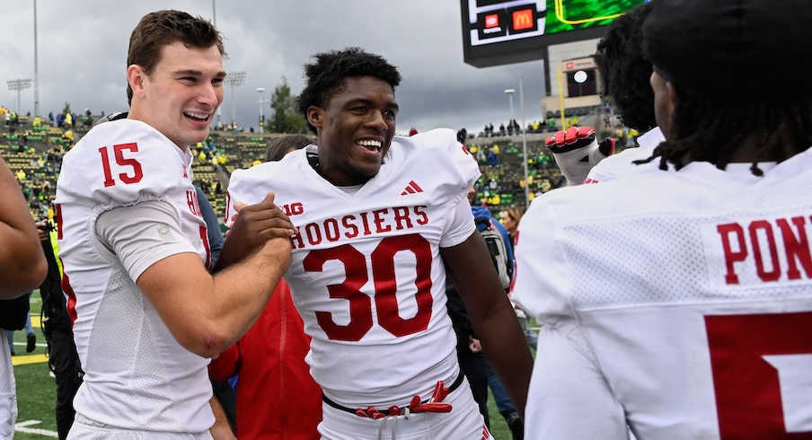 Fernando Mendoza and Kyler Kropp celebrate Indiana’s win