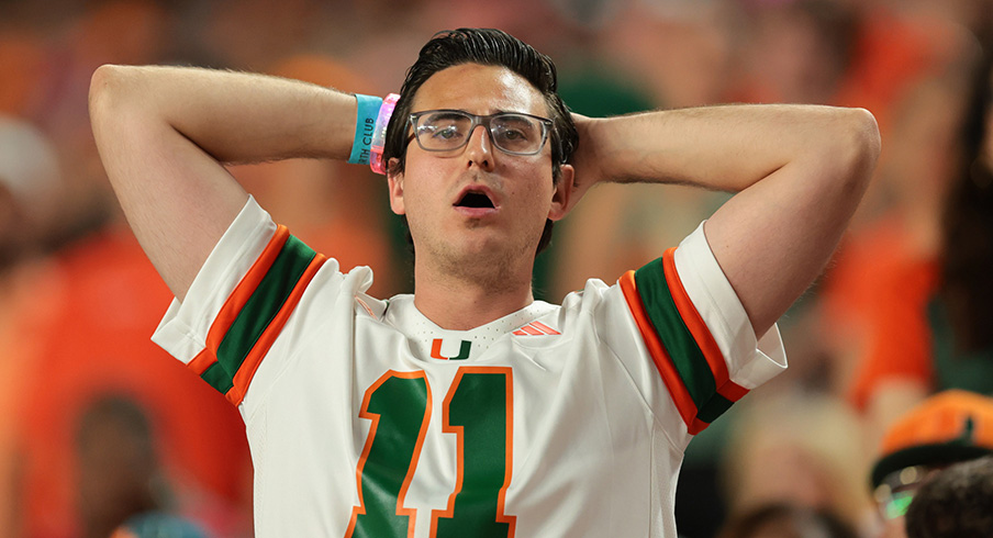 A Miami fan watches his No. 2 Hurricanes go down to Louisville