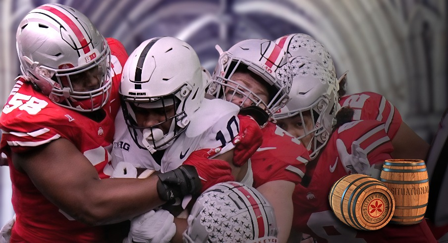 Oct 21, 2023; Columbus, Ohio, USA; Ohio State Buckeyes defensive tackle Ty Hamilton (58) bottles up Penn State Nittany Lions running back Nicholas Singleton (10) during the first half of the NCAA football game at Ohio Stadium.