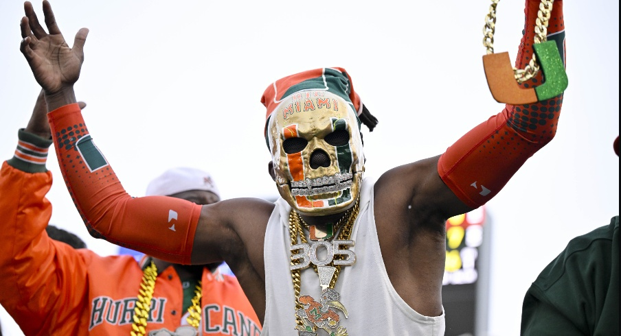 Miami Hurricanes fans cheer for Miami during the first quarter against the SMU