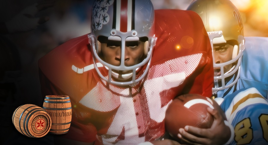 Jan 1, 1976, Pasadena, CA, USA; FILE PHOTO; Ohio State Buckeyes running back Archie Griffin (45) carries the ball against the UCLA Bruins during the 1976 Rose Bowl. The Bruins defeated the Buckeyes 23-10. Mandatory Credit: Malcolm Emmons-Imagn Images
