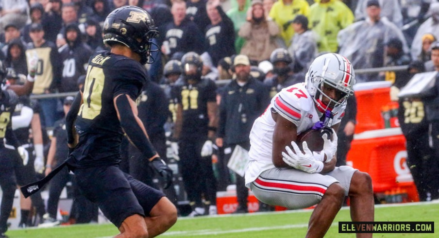 Ohio State wide receiver Carnell Tate (right)