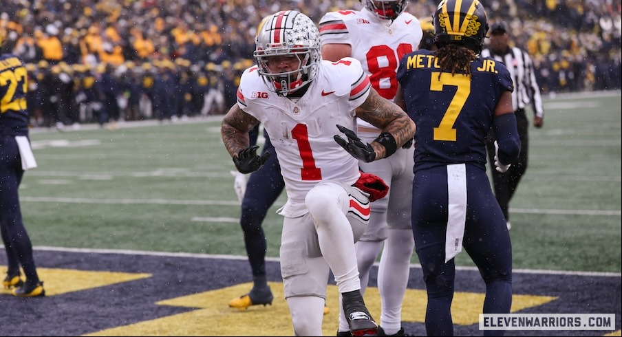 Brandon Inniss celebrating his touchdown vs. Michigan