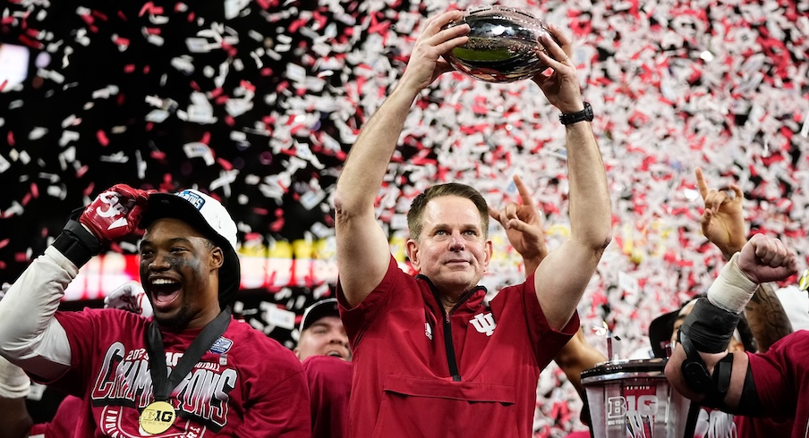 Curt Cignetti celebrating Indiana’s Big Ten Championship Game win