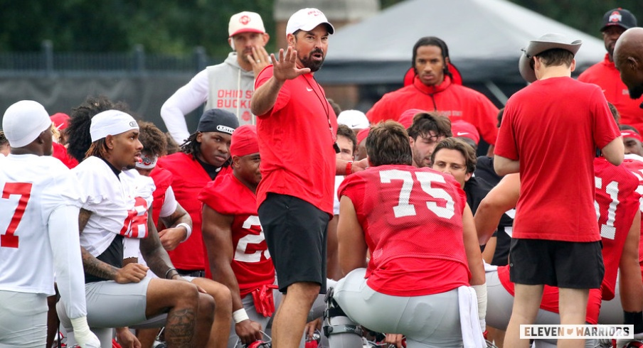 Ryan Day speaks to his team at practice
