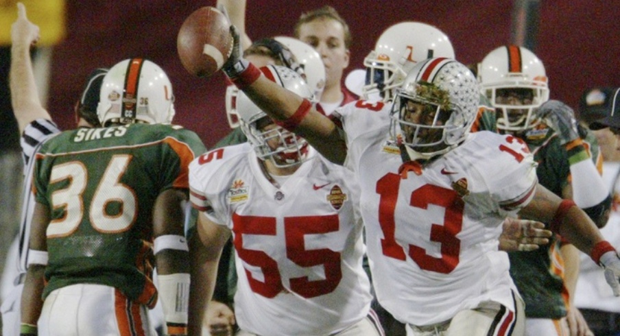 (FS FIESTA 3JAN03) 2003 Fiesta Bowl -- OSU vs. Miami -- Maurice Clarett celebrates after he pulled the ball from the hands of Sean Taylor at the National Football Championships at the Sun Devil Stadium in Tempe, Arizona, January 3, 2003. (Dispatch photo by Fred Squillante)