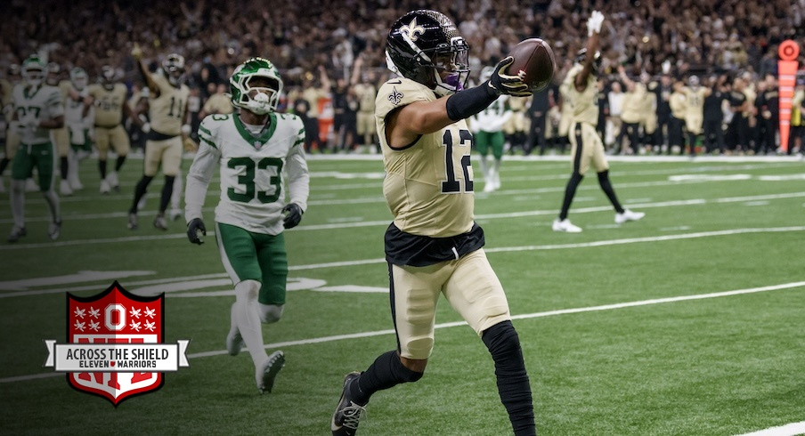 Chris Olave scoring a touchdown vs. the Jets