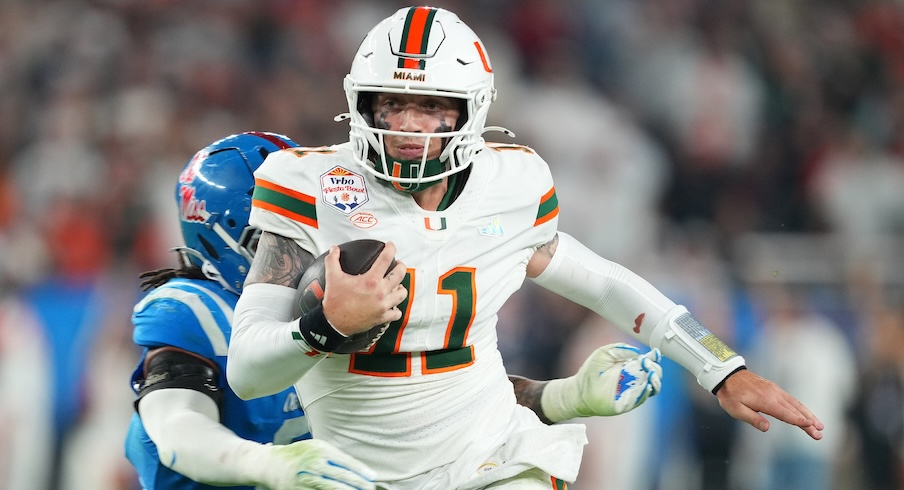 Carson Beck running the ball vs. Ole Miss