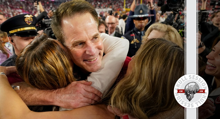 Curt Cignetti hugs his family