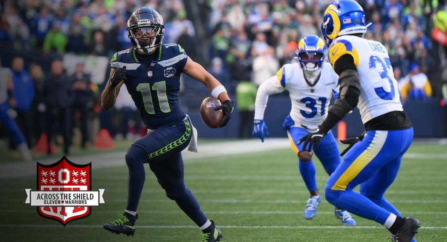 Jaxon Smith-Njigba running after a catch vs. the Rams