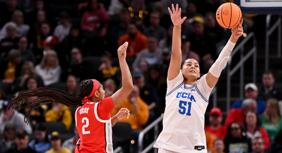 Lauren Betts blocks a shot from Chance Gray