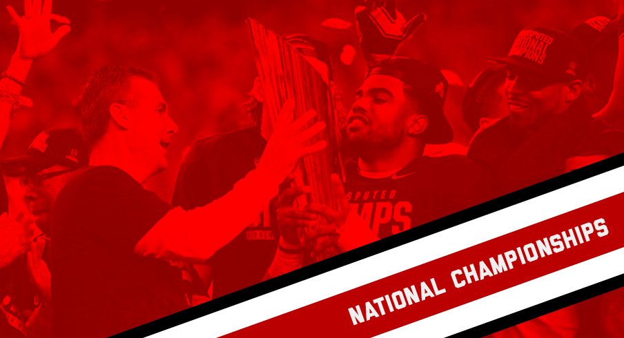 Urban Meyer and Ezekiel Elliott celebrate winning the College Football Playoff